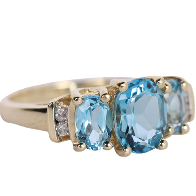 10K Yellow Gold Blue Topaz Three-Stone Past Present Future Ring