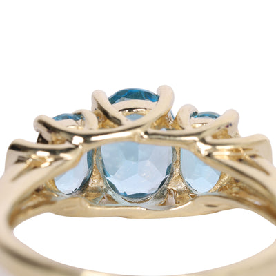 10K Yellow Gold Blue Topaz Three-Stone Past Present Future Ring