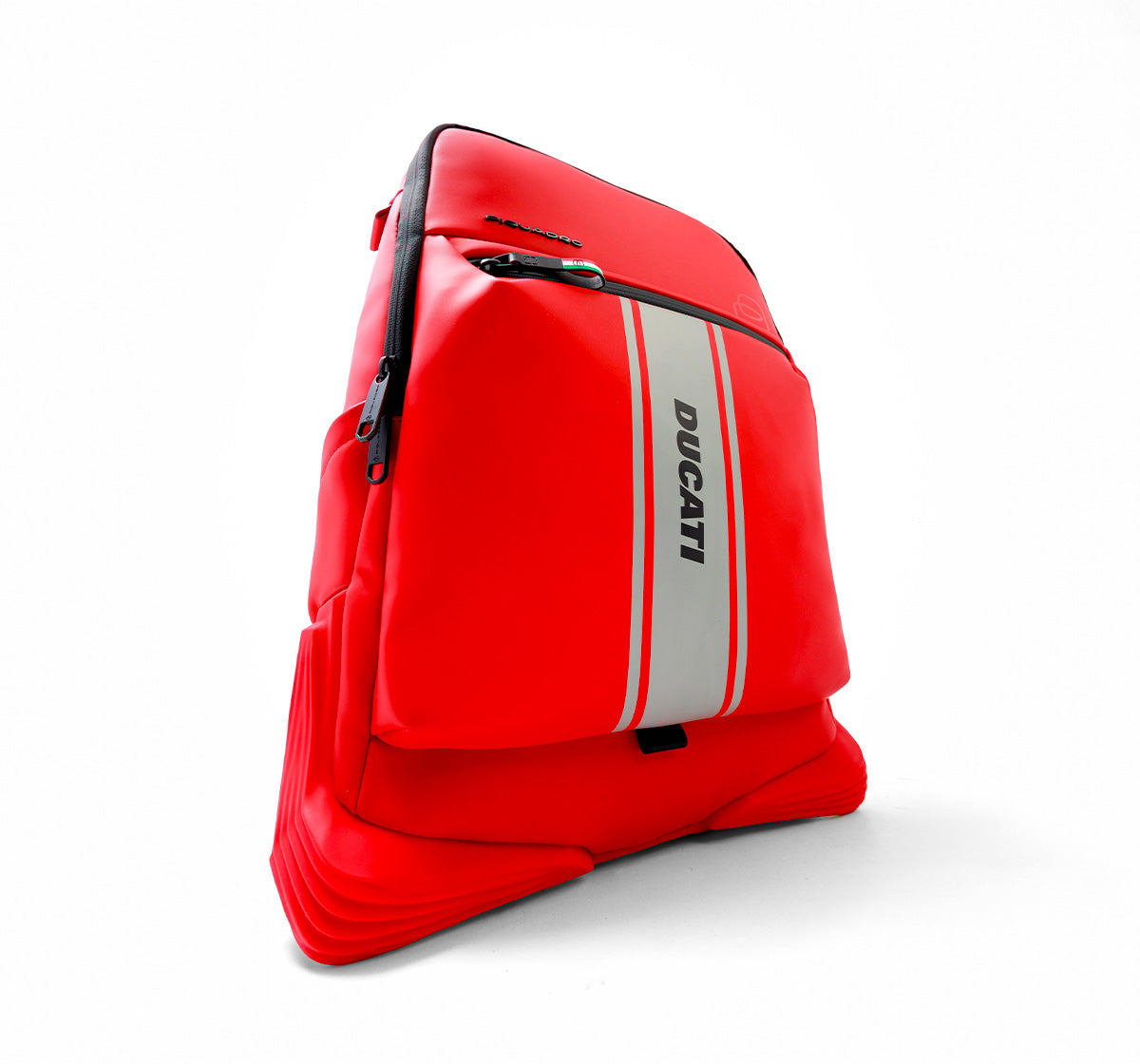 Red Ducati-branded backpack standing upright on a white background, featuring a central grey stripe, black zipper, and sculpted padded base.