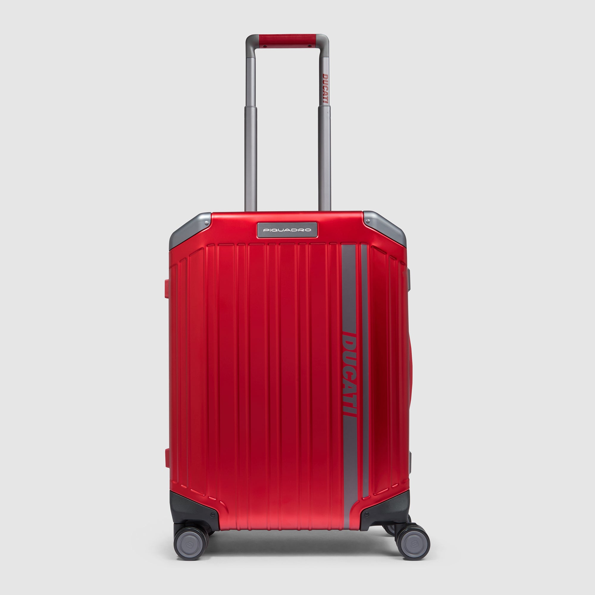 Piquadro × Ducati limited-edition cabin suitcase, aluminum and leather, TSA lock, retractable handles, 31 L capacity.