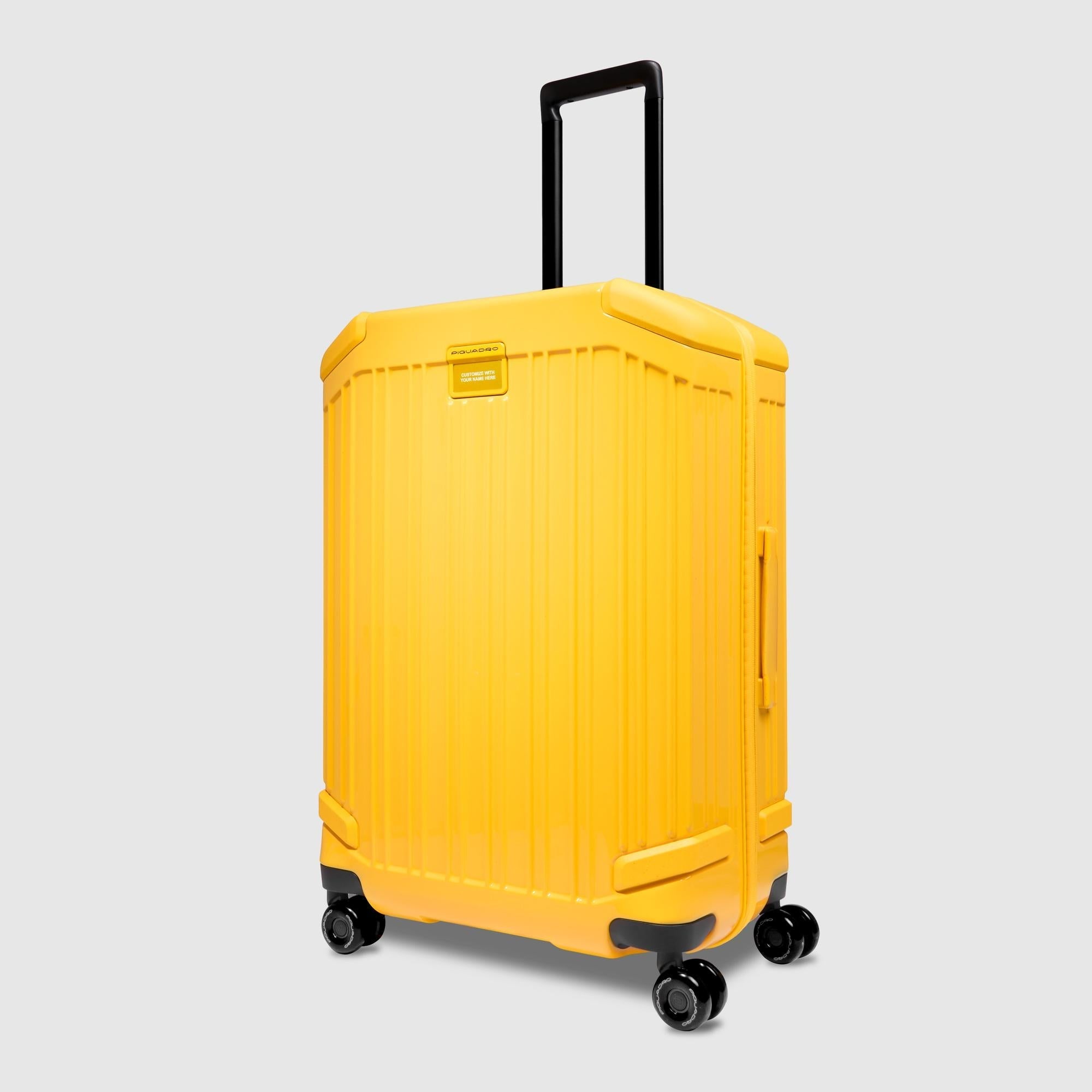 Medium size, expandable 4 wheel suitcase