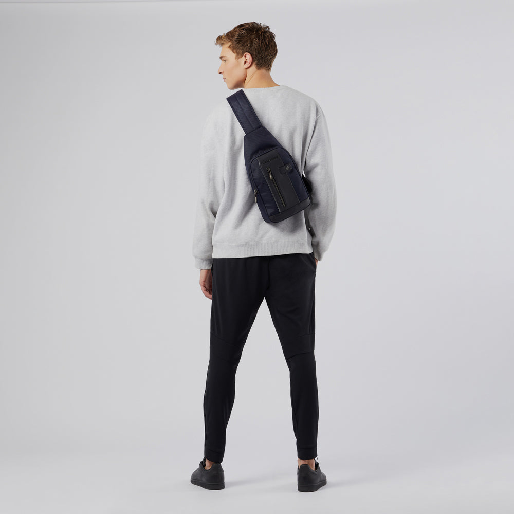 Sling bag in recycled textile with LED light