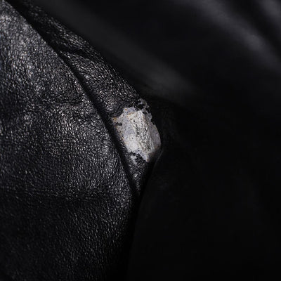 1996-1997 Black Duma Quilted Lambskin Leather Backpack Bag
